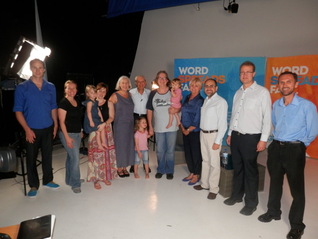 The GNU team at the TV studio. R–L Colin MacLaurin, Caroline Wood, Sara Littman, Des Ford, Duncan Wood, Bilyana de Soto, Eliezer Gonzalez, Philip Rodionoff, Laimon Eglantals