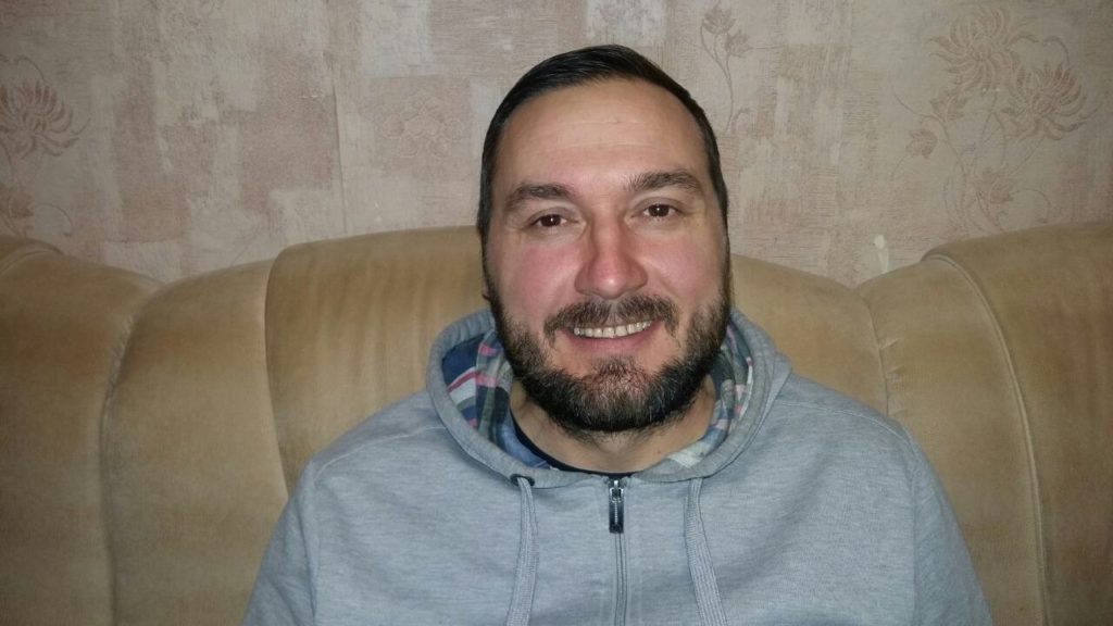 Yurii now shares the Good News in the very prison where he served time